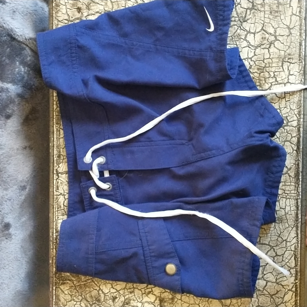 Blue and white Nike board shorts